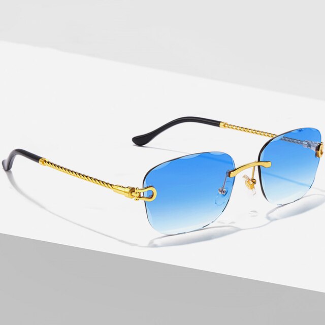 Unisex Zonnebril met Gekleurde Glazen en Goudkleurig Montuur UV400 Bescherming en Luxe Randloos Design