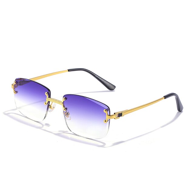 Unisex Zonnebril met Gekleurde Glazen en Goudkleurig Montuur UV400 Bescherming en Luxe Randloos Design