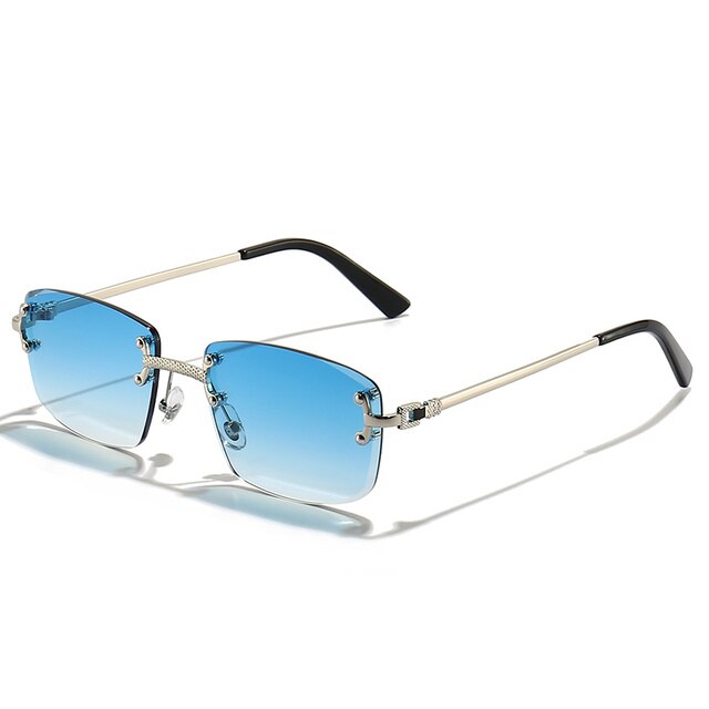 Unisex Zonnebril met Gekleurde Glazen en Goudkleurig Montuur UV400 Bescherming en Luxe Randloos Design