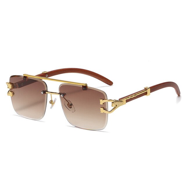 Unisex Zonnebril met Gekleurde Glazen en Goudkleurig Montuur UV400 Bescherming en Luxe Randloos Design