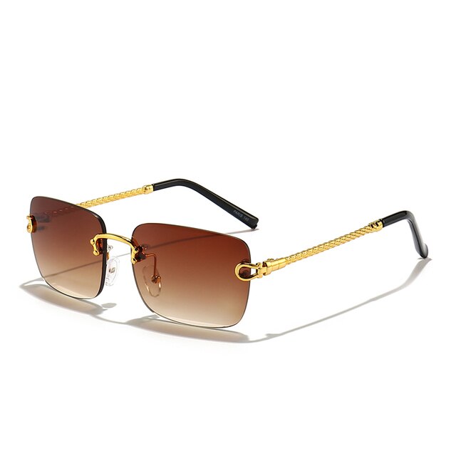 Unisex Zonnebril met Gekleurde Glazen en Goudkleurig Montuur UV400 Bescherming en Luxe Randloos Design
