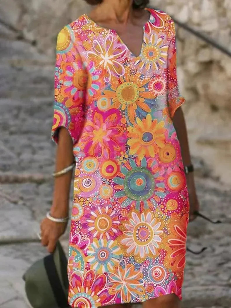 Zomerse damesjurk met bloemenprint in diverse kleuren – luchtig model voor vakantie, strand en vrije tijd