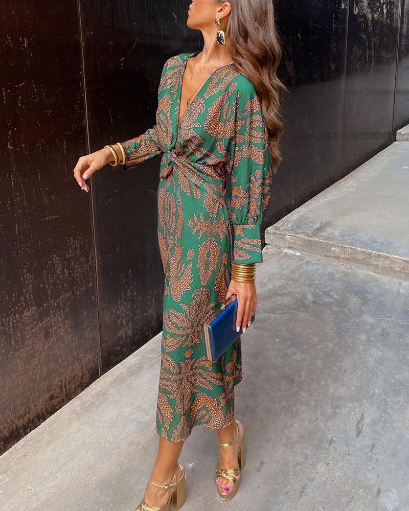 Luxe maxi jurk met diepe V-hals, gouden print en lange mouwen – stijlvolle feestjurk voor dames