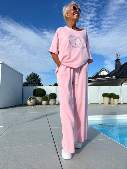 Dames loungewear set met oversized T-shirt en wijde broek – comfortabel huispak in diverse uitvoeringen voor ontspannen dagen