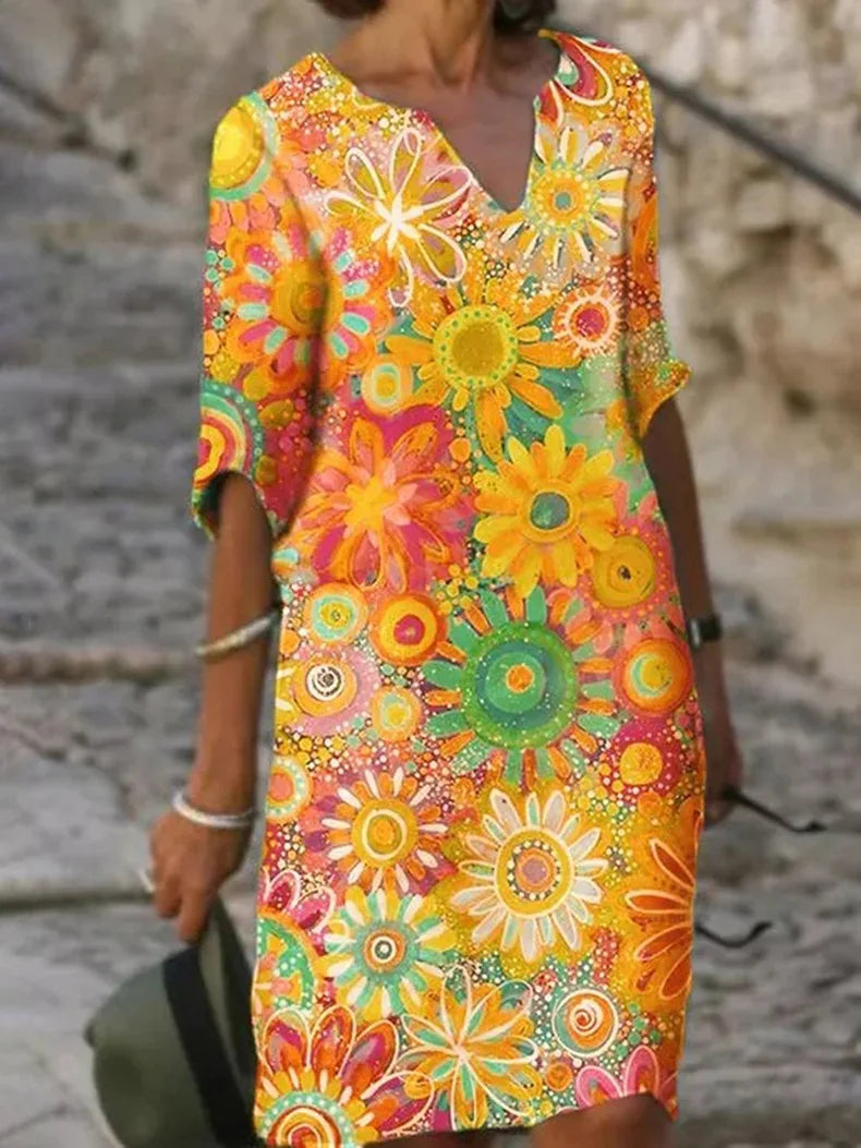 Zomerse damesjurk met bloemenprint in diverse kleuren – luchtig model voor vakantie, strand en vrije tijd