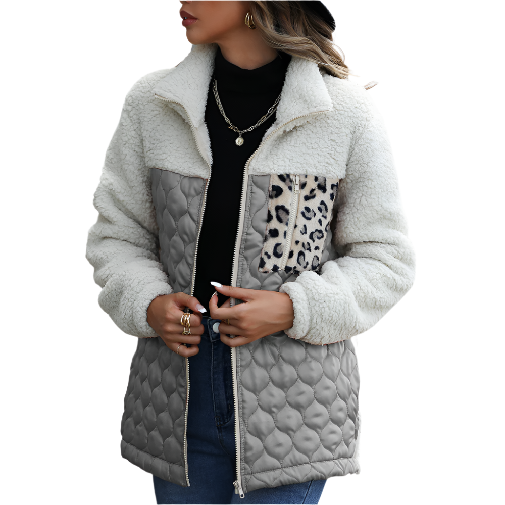 Warme dames jas van teddy fleece met gewatteerde details en ritssluiting ideaal voor frisse dagen in stijl