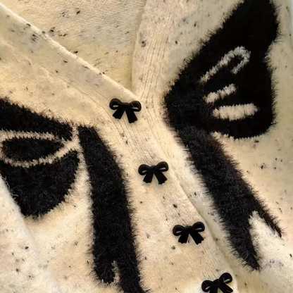 Mirella - Damesvest met speels strikdessin