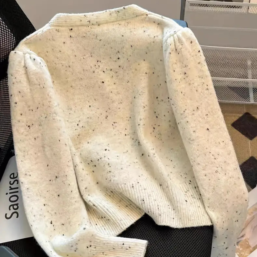 Mirella - Damesvest met speels strikdessin