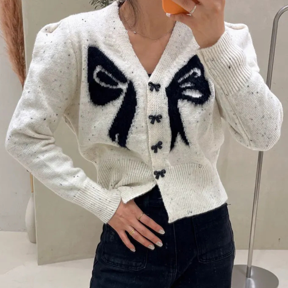 Mirella - Damesvest met speels strikdessin