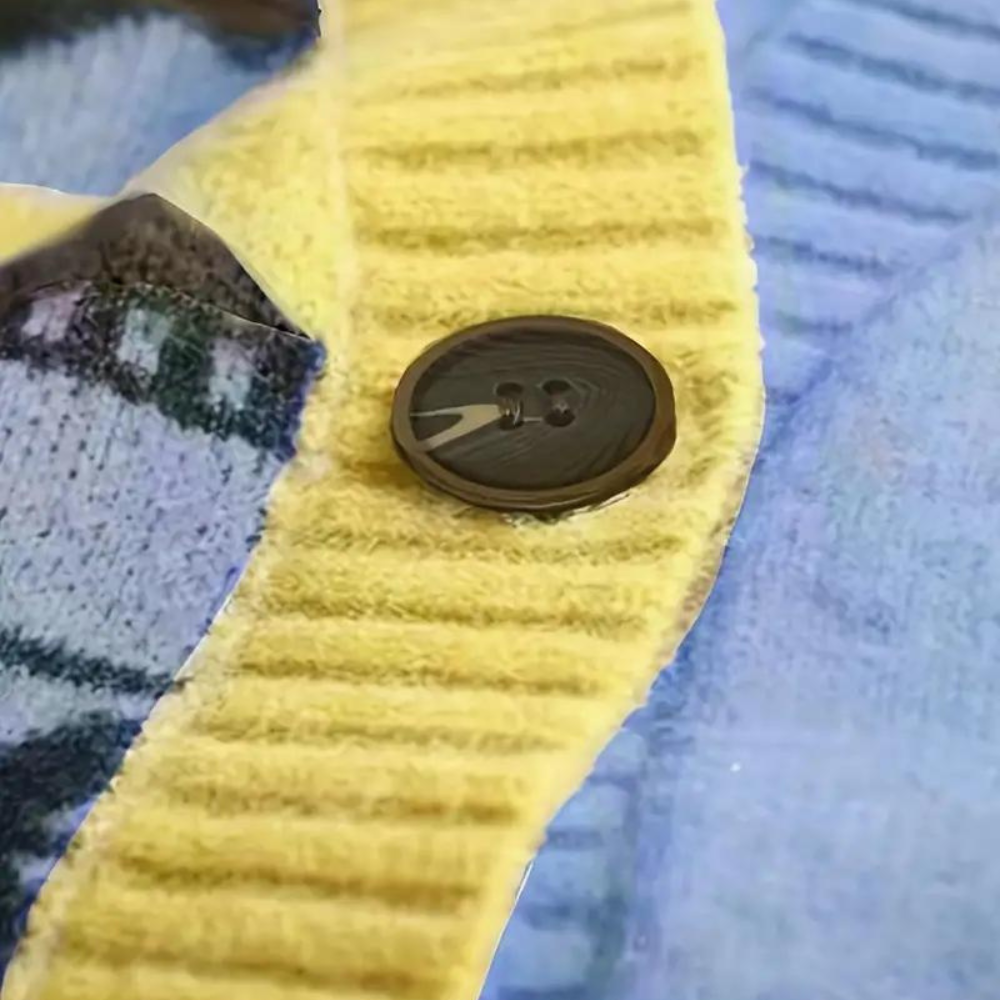 Dames Gebreid Vest met Knopen en Geweven Details Comfort en Karakter in Één Look