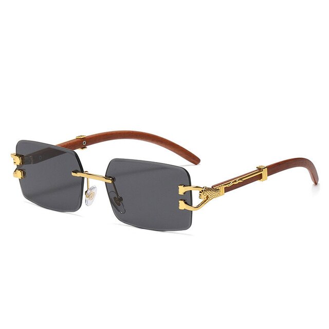 Unisex Zonnebril met Gekleurde Glazen en Goudkleurig Montuur UV400 Bescherming en Luxe Randloos Design