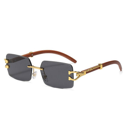 Unisex Zonnebril met Gekleurde Glazen en Goudkleurig Montuur UV400 Bescherming en Luxe Randloos Design