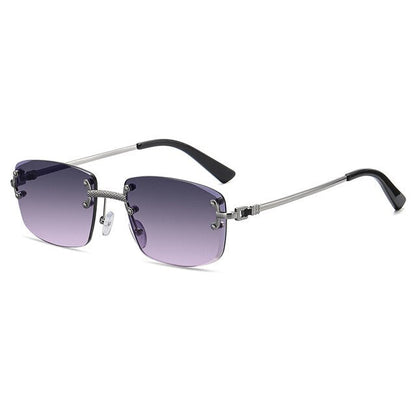 Unisex Zonnebril met Gekleurde Glazen en Goudkleurig Montuur UV400 Bescherming en Luxe Randloos Design