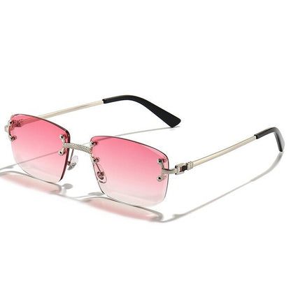 Unisex Zonnebril met Gekleurde Glazen en Goudkleurig Montuur UV400 Bescherming en Luxe Randloos Design