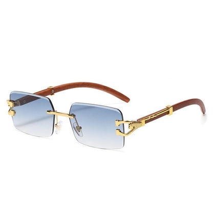 Unisex Zonnebril met Gekleurde Glazen en Goudkleurig Montuur UV400 Bescherming en Luxe Randloos Design