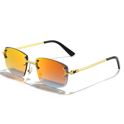 Unisex Zonnebril met Gekleurde Glazen en Goudkleurig Montuur UV400 Bescherming en Luxe Randloos Design