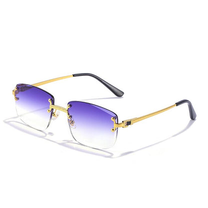 Unisex Zonnebril met Gekleurde Glazen en Goudkleurig Montuur UV400 Bescherming en Luxe Randloos Design