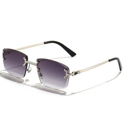 Unisex Zonnebril met Gekleurde Glazen en Goudkleurig Montuur UV400 Bescherming en Luxe Randloos Design