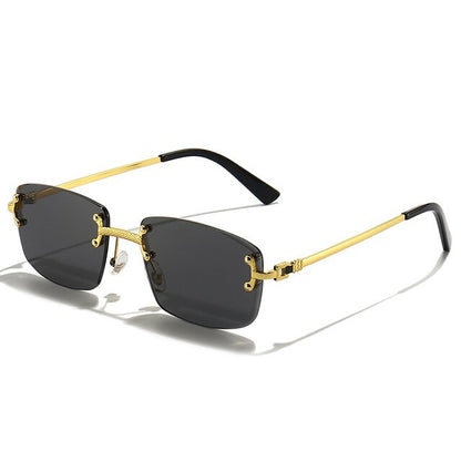Unisex Zonnebril met Gekleurde Glazen en Goudkleurig Montuur UV400 Bescherming en Luxe Randloos Design