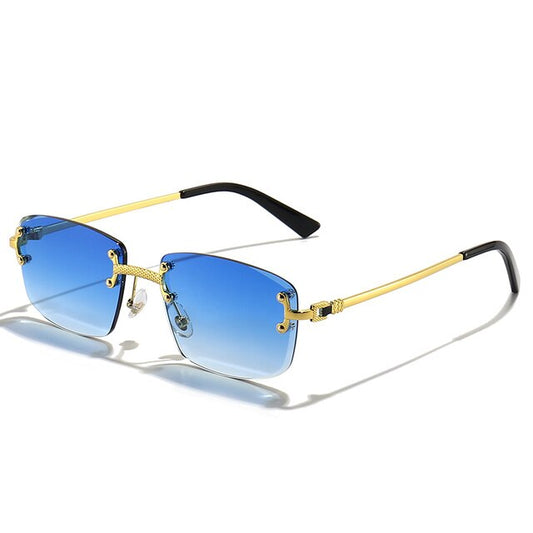 Unisex Zonnebril met Gekleurde Glazen en Goudkleurig Montuur UV400 Bescherming en Luxe Randloos Design