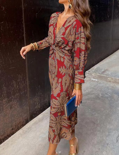 Luxe maxi jurk met diepe V-hals, gouden print en lange mouwen – stijlvolle feestjurk voor dames