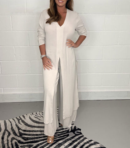 Dames tweedelig pak met elegante lange top en wijde broek in diverse kleuren