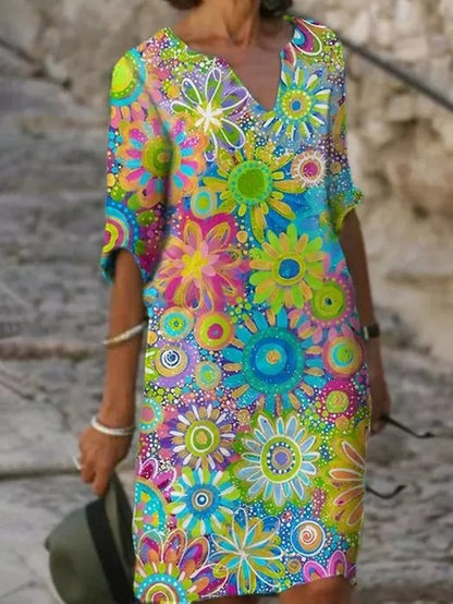 Zomerse damesjurk met bloemenprint in diverse kleuren – luchtig model voor vakantie, strand en vrije tijd