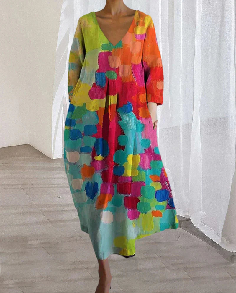 Dames maxi jurk met V-hals en kleurrijke print in diverse kleuren – luchtige zomerjurk met losvallende pasvorm