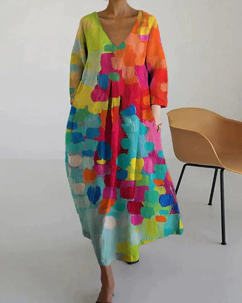 Dames maxi jurk met V-hals en kleurrijke print in diverse kleuren – luchtige zomerjurk met losvallende pasvorm